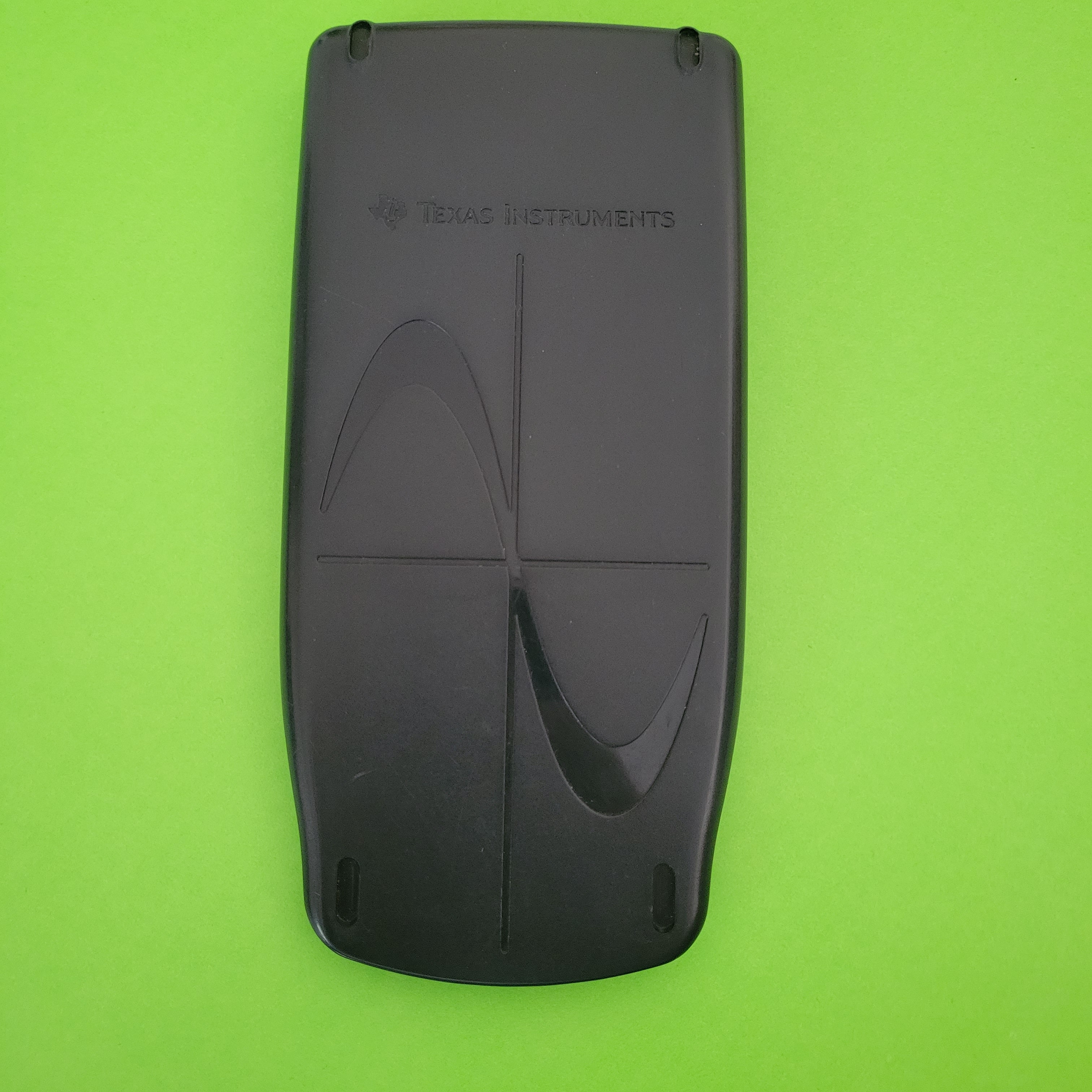 An image of the case of a texas instruments ti83 plus graphing calculator